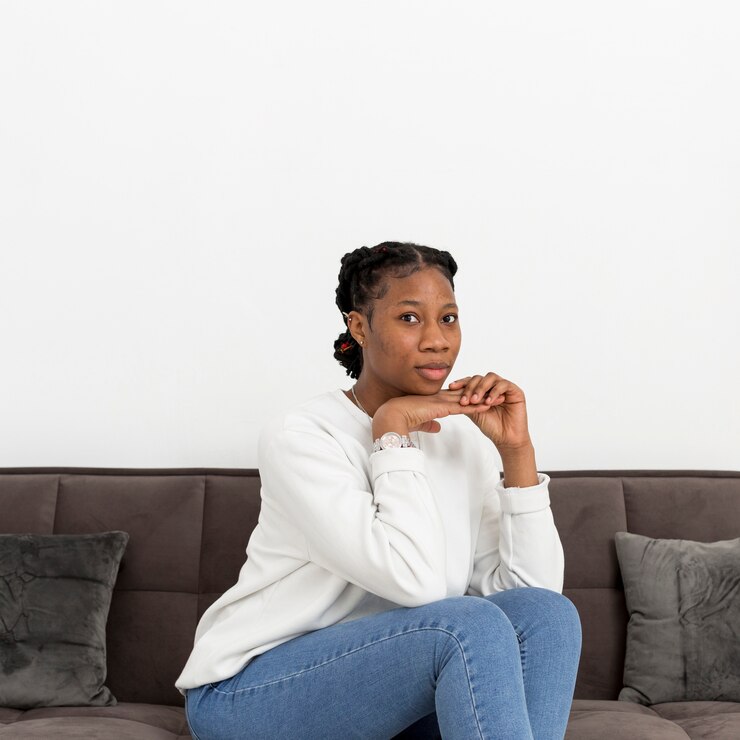 portrait-young-woman-sitting-couch